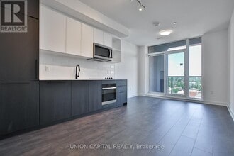 Building Photo - 1185 Dupont St