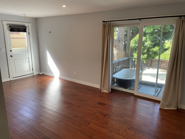 Living room, showing both entrances - 707 Colusa Ave