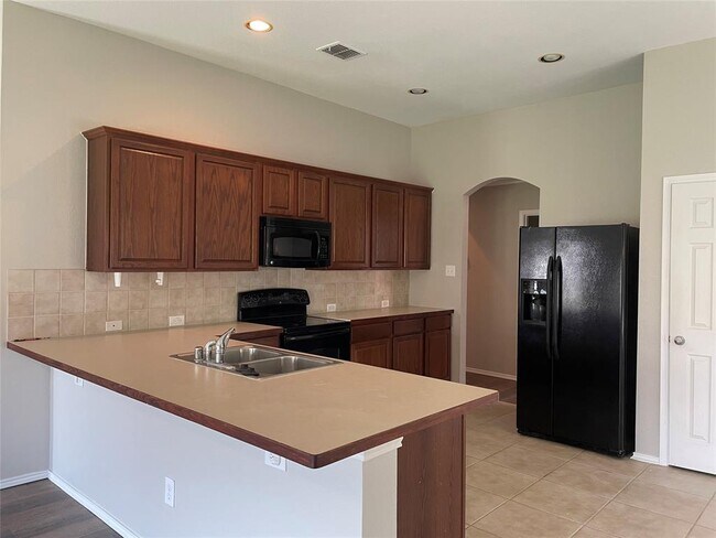 Building Photo - 5720 Moon Flower Ct