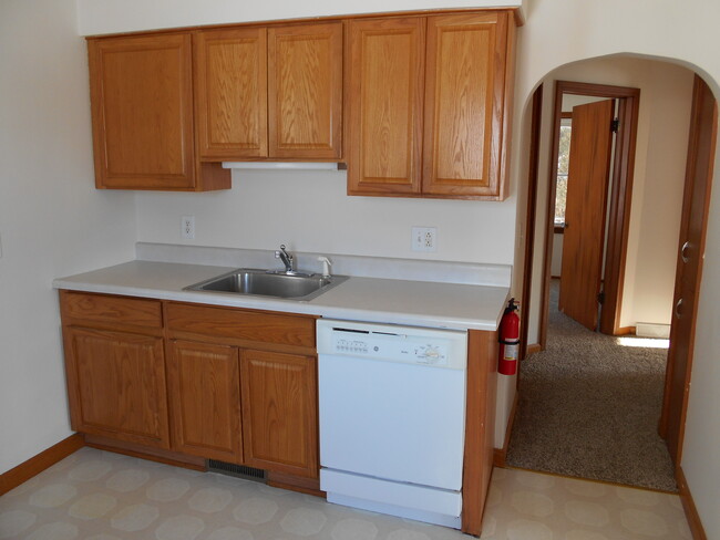 Eat-in kitchen includes dishwasher - 807 Powell Ave
