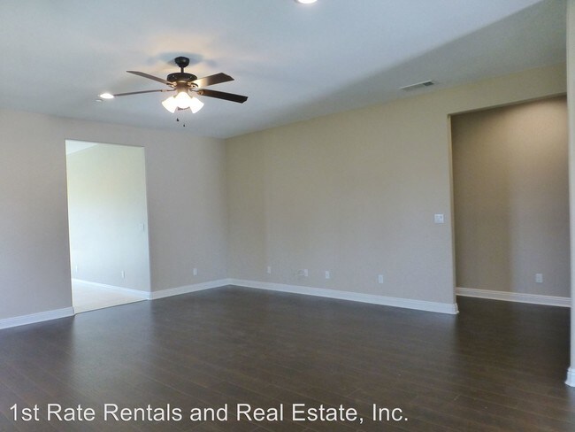 Building Photo - 4 br, 2 bath House - 4948 Hollyhock Ln