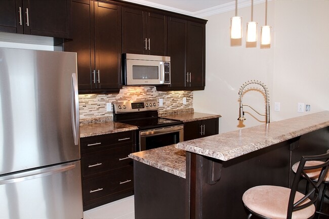 Kitchen includes stainless steel appliances - 60 Margaret's Pl