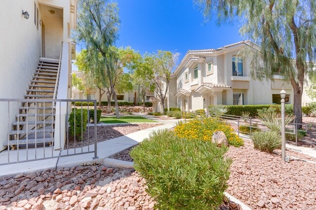 Building Photo - Charming 2-Bed/2-Bath Condo with Dual Mast...