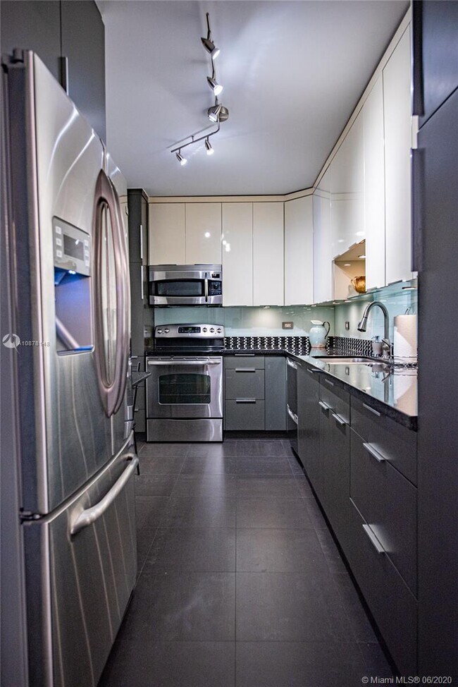 Building Photo - 10185 Collins Ave