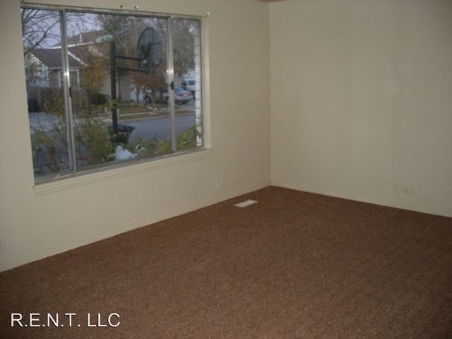 Building Photo - 4 br, 2 bath House - 4939 W. Silvertip Drive