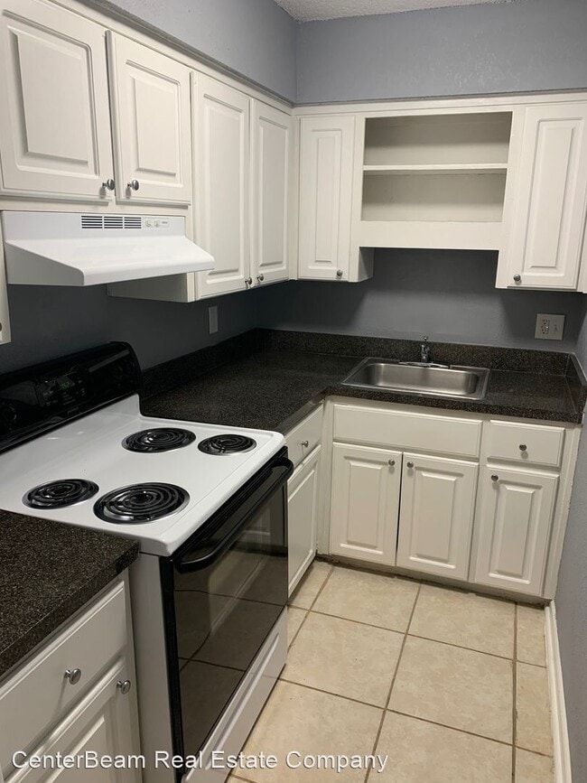 Building Photo - 8145 San Jose Manor Dr E