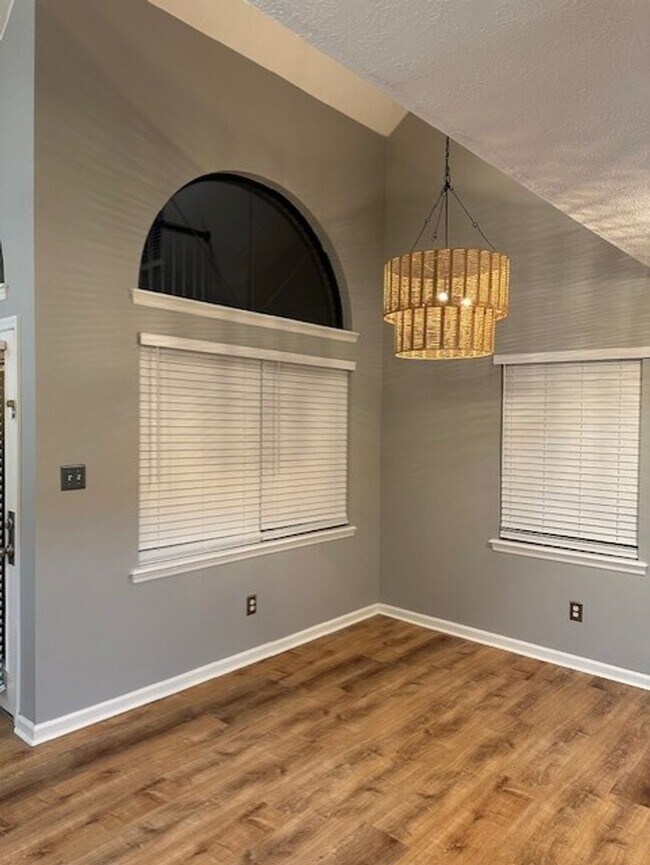 Building Photo - BEAUTIFUL FULLY RENOVATED Townhouse, 2 BR, 2 Bath, Carport & Deck; Pets Ok!