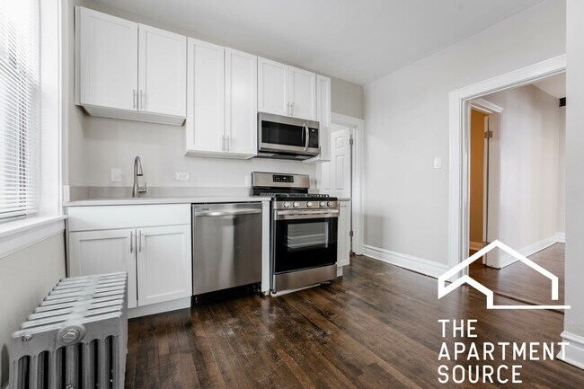 Building Photo - 3825 N Drake Ave