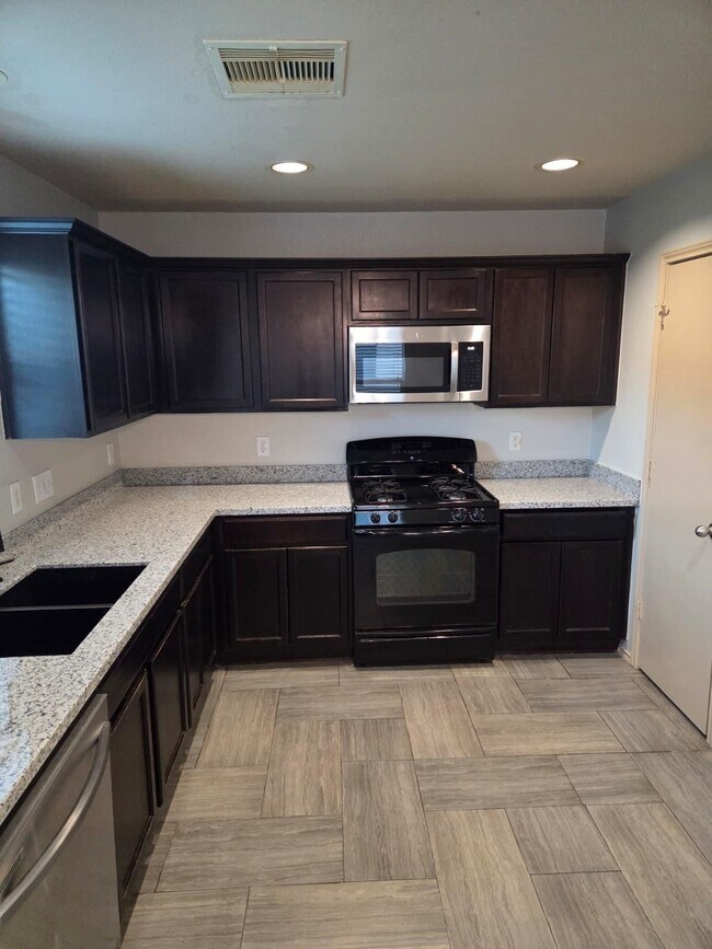 Foto del edificio - 5518 Rustling Gates Ln