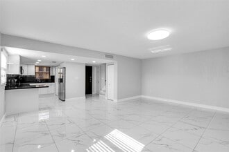 Building Photo - 5061 W 12th Ln