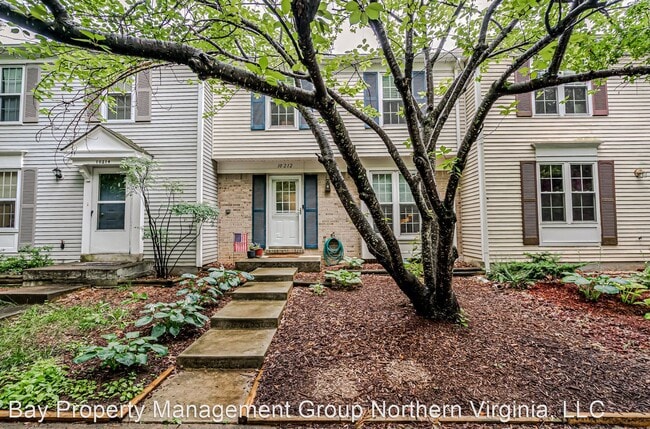 Building Photo - 3 br, 2.5 bath House - 10212 SASSAFRAS WOO...