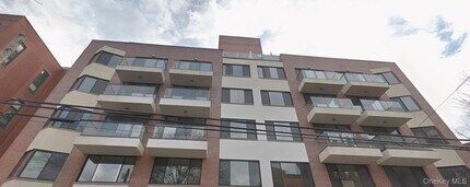 Building Photo - 136-46 41st Ave