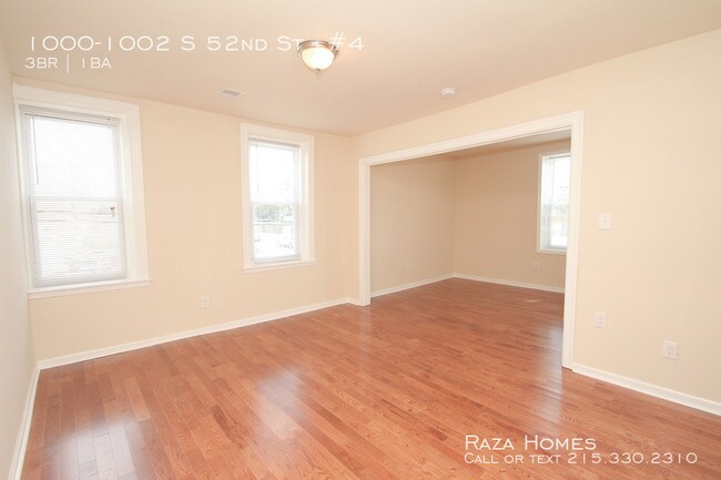 Building Photo - 1000-1002 S 52nd St #4
