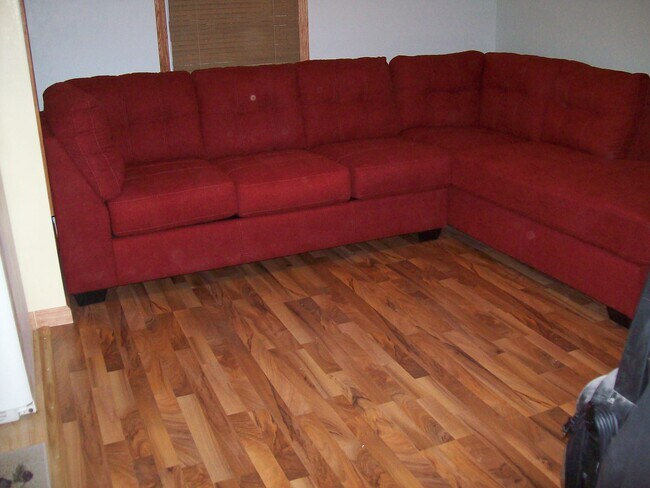 Newly remodeled laminate flooring in Living room.. - 2833 Eisenhower Drive