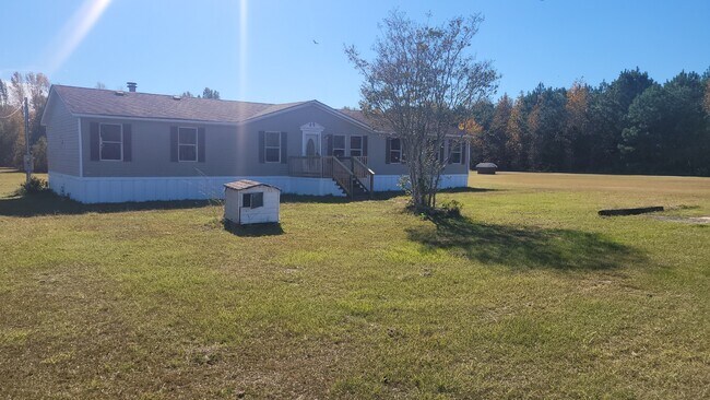 Foto del edificio - 7424 Five Chop Rd