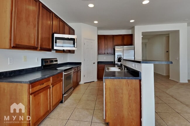 Building Photo - 9928 W Marguerite Ave