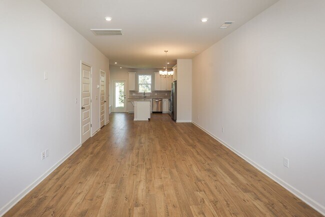Building Photo - NEW CONSTRUCTION AT A GREAT RENTAL PRICE. ...