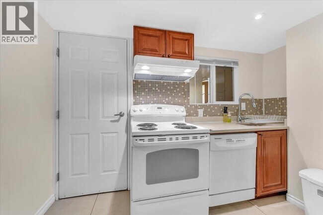 Photo du bâtiment - 1476 W 33rd Ave