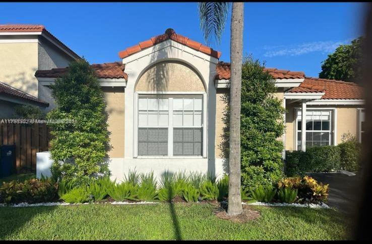 Foto principal - 5596 NW 102nd Ct