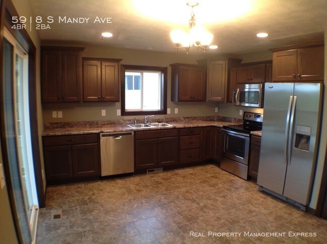 Building Photo - Rare 4 Bedroom Twin Home with 3 stall garage!