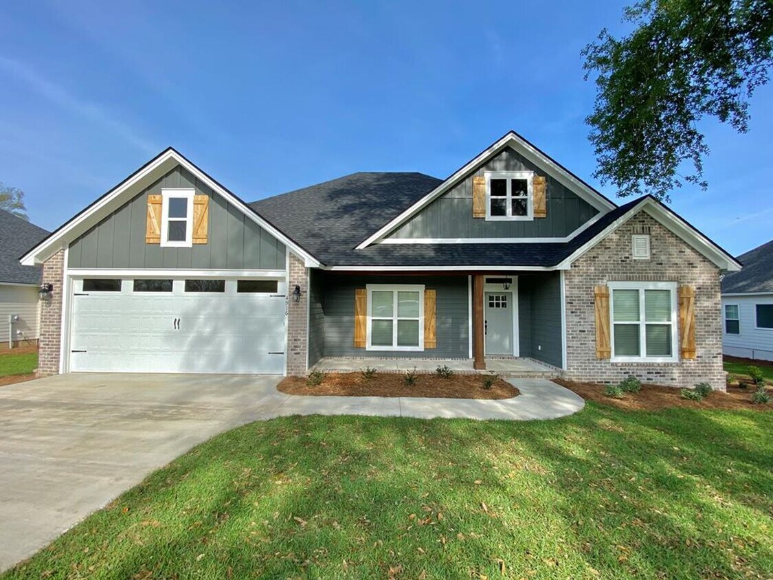 Primary Photo - Spacious 4-Bedroom Home with Luxurious Fea...