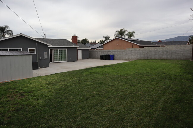 Building Photo - 9983 Vernon Ave
