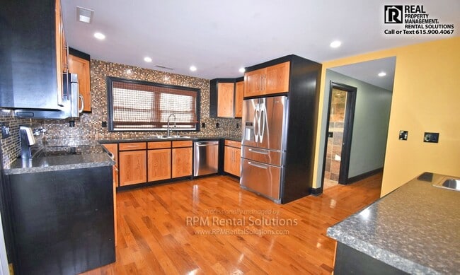 Photo - 3BR/2BA one level, carport+detached garage/workshop, washer/dryer included, on 1.6 acres in M'boro! House