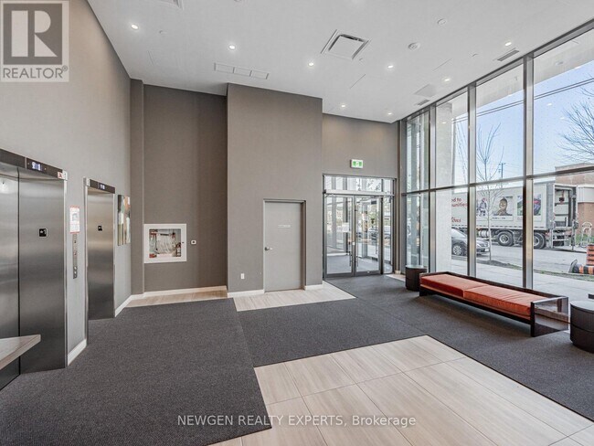 Building Photo - 859 The Queensway