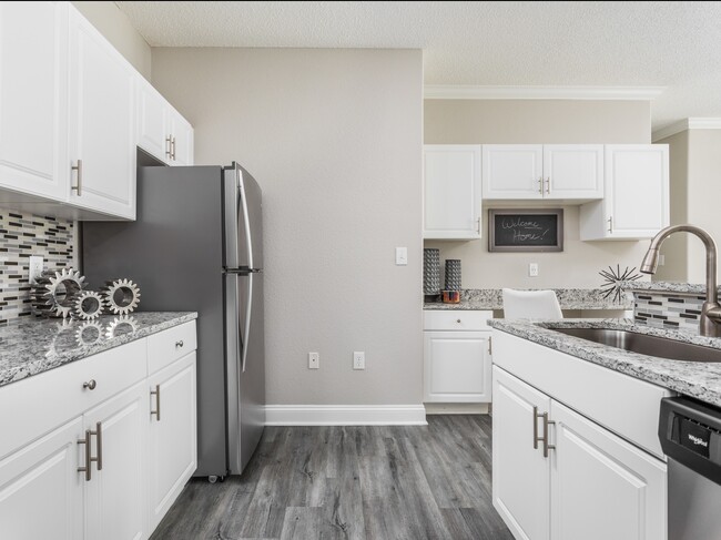 Upgraded Kitchen with Stainless Steel Appliances - The Village at Auburn Apartments