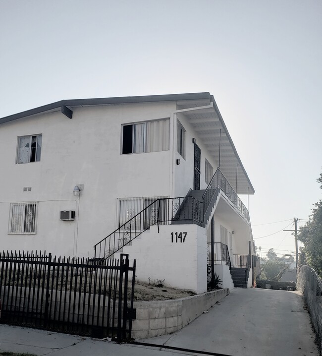 Building Photo - 1147 S Serrano Ave