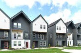 Primary Photo - New construction three-story townhome offe...