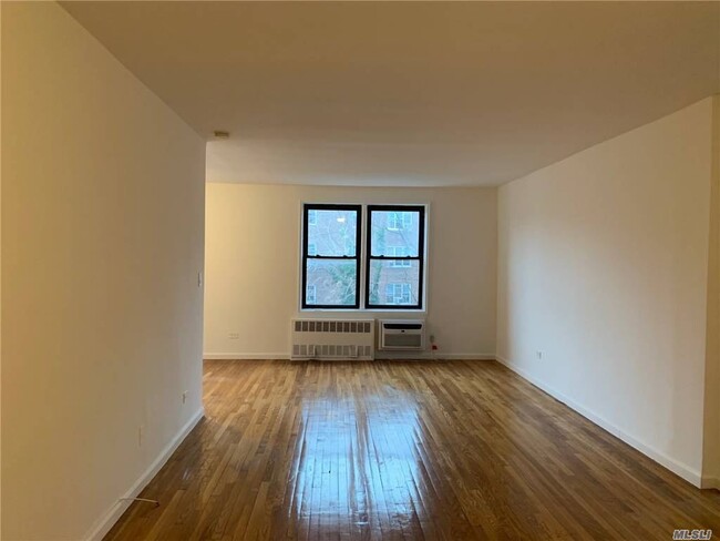 Building Photo - 102-30 Queens Blvd