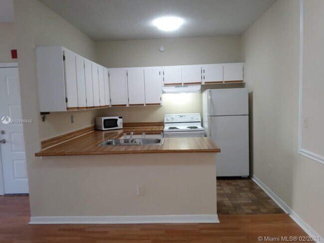Building Photo - 18304 NW 68th Ave