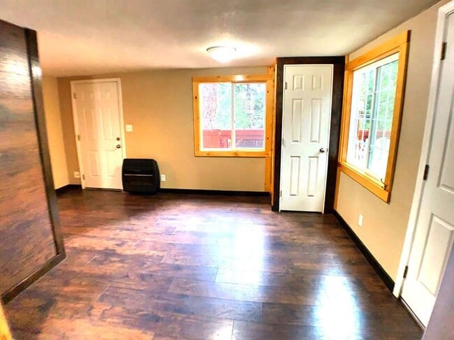 Building Photo - Adorable log cabin style home for rent near Hwy-50 and Safeway!
