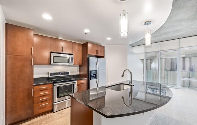 Building Photo - 1BD, 1BA Condo at The Spire with Bonus Fle...
