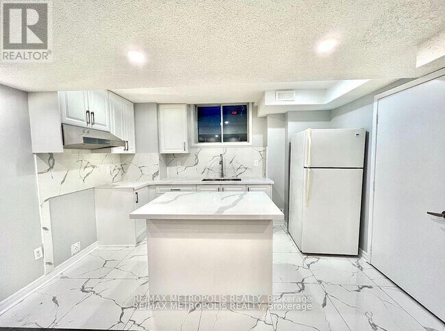 Photo du bâtiment - 312 McLevin Ave