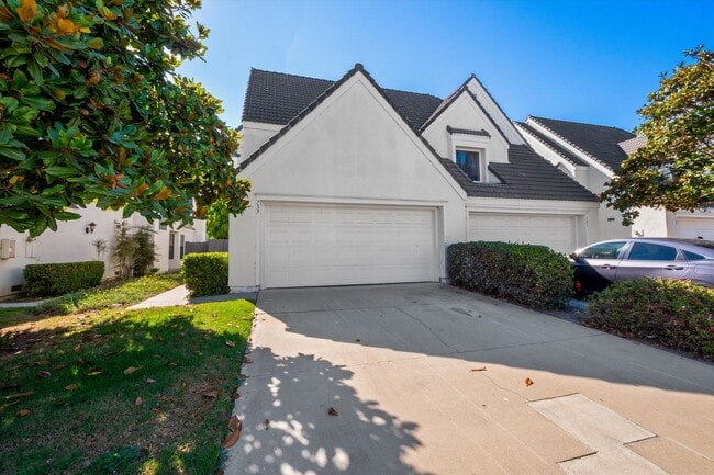 Building Photo - Renovated 2bed x 2.5bath Townhouse with Private Patio & 2-Car Garage