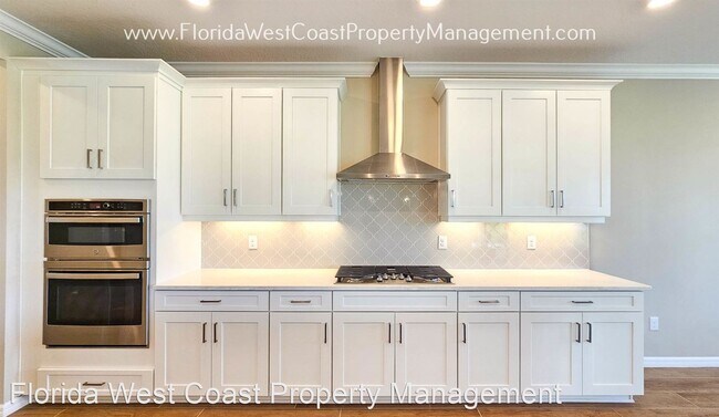 Foto del edificio - 5 br, 4.5 bath House - 10200 Milky Way Cir