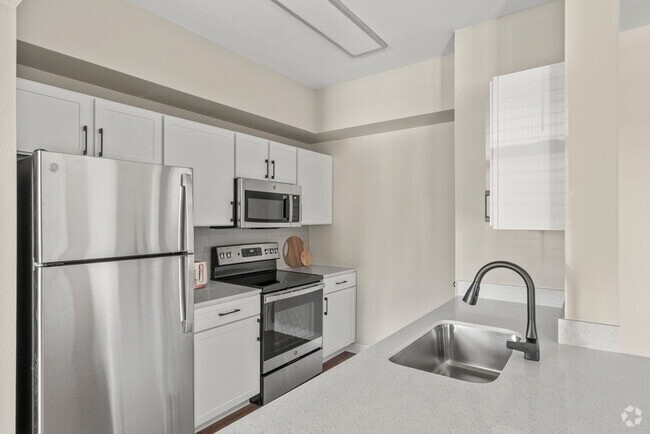 Building Photo - Unwind in Our Stylish 1 Bedroom Apartments