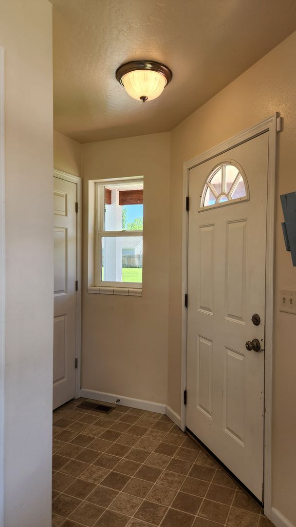Building Photo - Beautiful House with Yard and Pets Considered