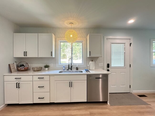 Building Photo - This FULLY FURNISHED ALL INCLUSVIE HOME IS...
