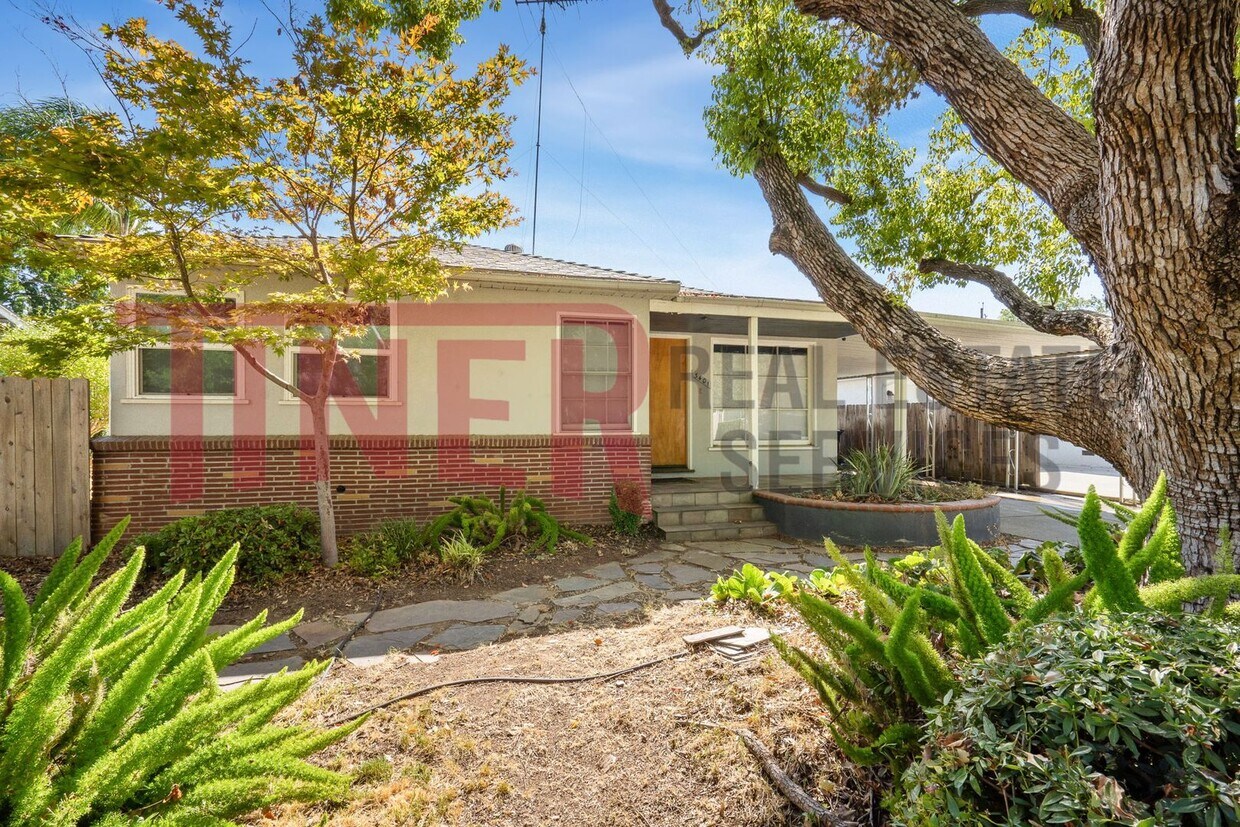 Primary Photo - Nicely Updated Tahoe Park Gem on Huge Lot!