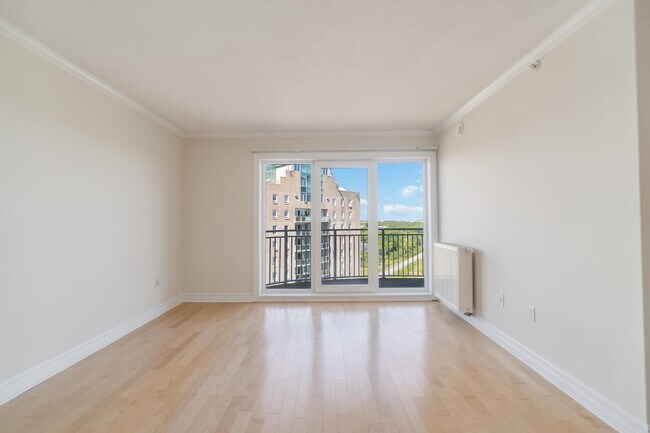 Photo du bâtiment - WELCOME TO THE SUMMIT - ONE BEDROOM PLUS DEN APARTMENT AVAILABLE