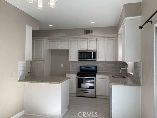 Building Photo - 23818 Los Codona Ave
