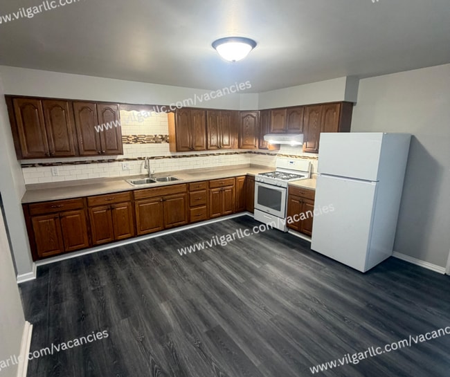 Building Photo - 5583-85-5585 Tulip Ave
