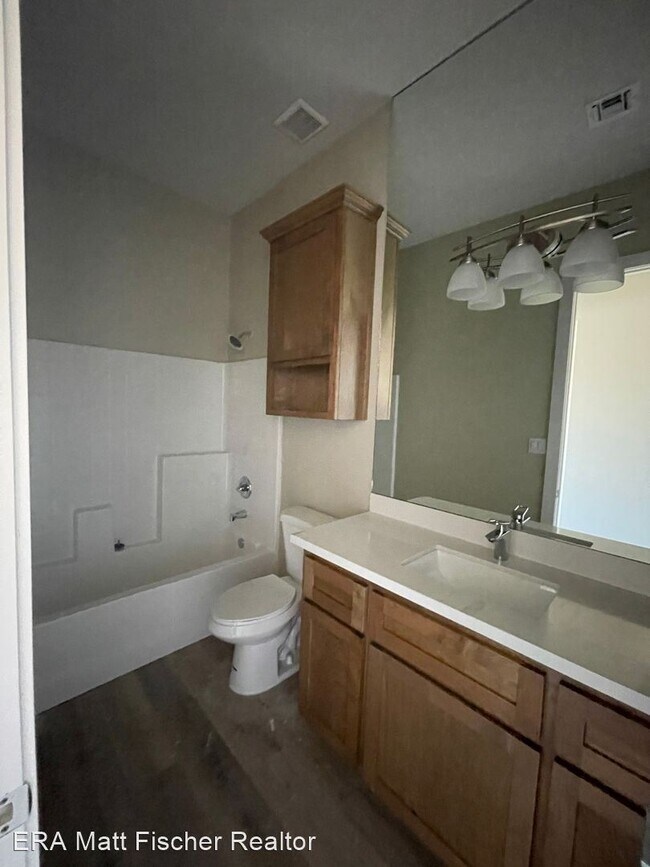 Foto del edificio - 4 br, 3.5 bath House - 14827 E 47TH DRIVE