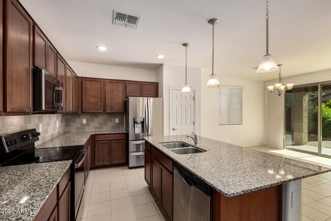 Building Photo - 7046 N 84th Dr