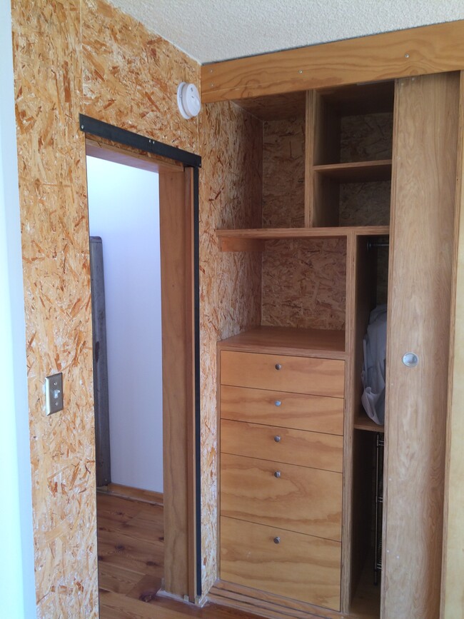 Bedroom closet w/built in drawers - 1524 10th St