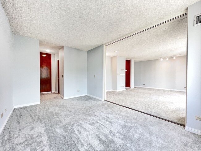 Building Photo - Immaculate Honolulu Condo with Central A/C, Secured Parking, Including Electricity