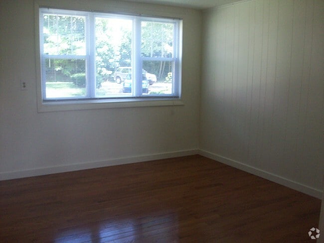 Sala de estar - Evergreen Town House Apartments